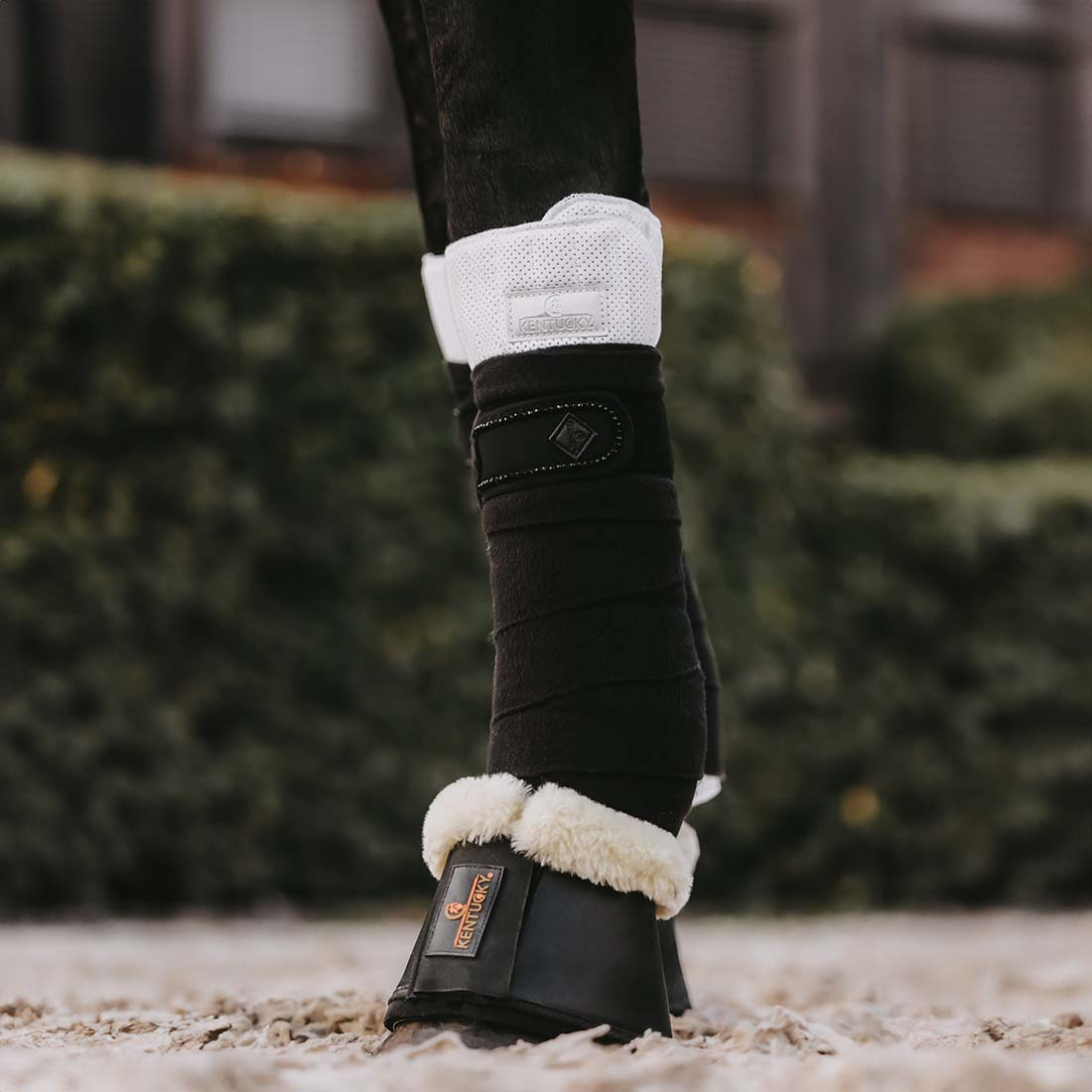 Protections de jambe Working Absorb Blanc/Noir